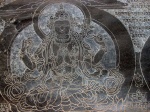 Mani wall carving of Avalokitesvara, Ghap, Nepal (Photo: Manaslu's Mountains of Travel photo gallery)
